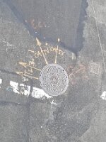 Pavement and manhole