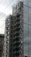 Reflections of one building in another (Astor Place) 