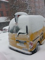 Rooftop sign and rearview wiper