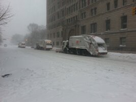 Sanitation truck convoy on 2nd Ave 