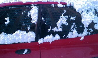 Snow on car window